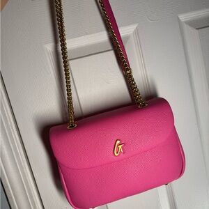 Elegant Pink Crossbody Bag with Gold Accents